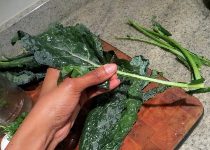Removing Kale from its stem